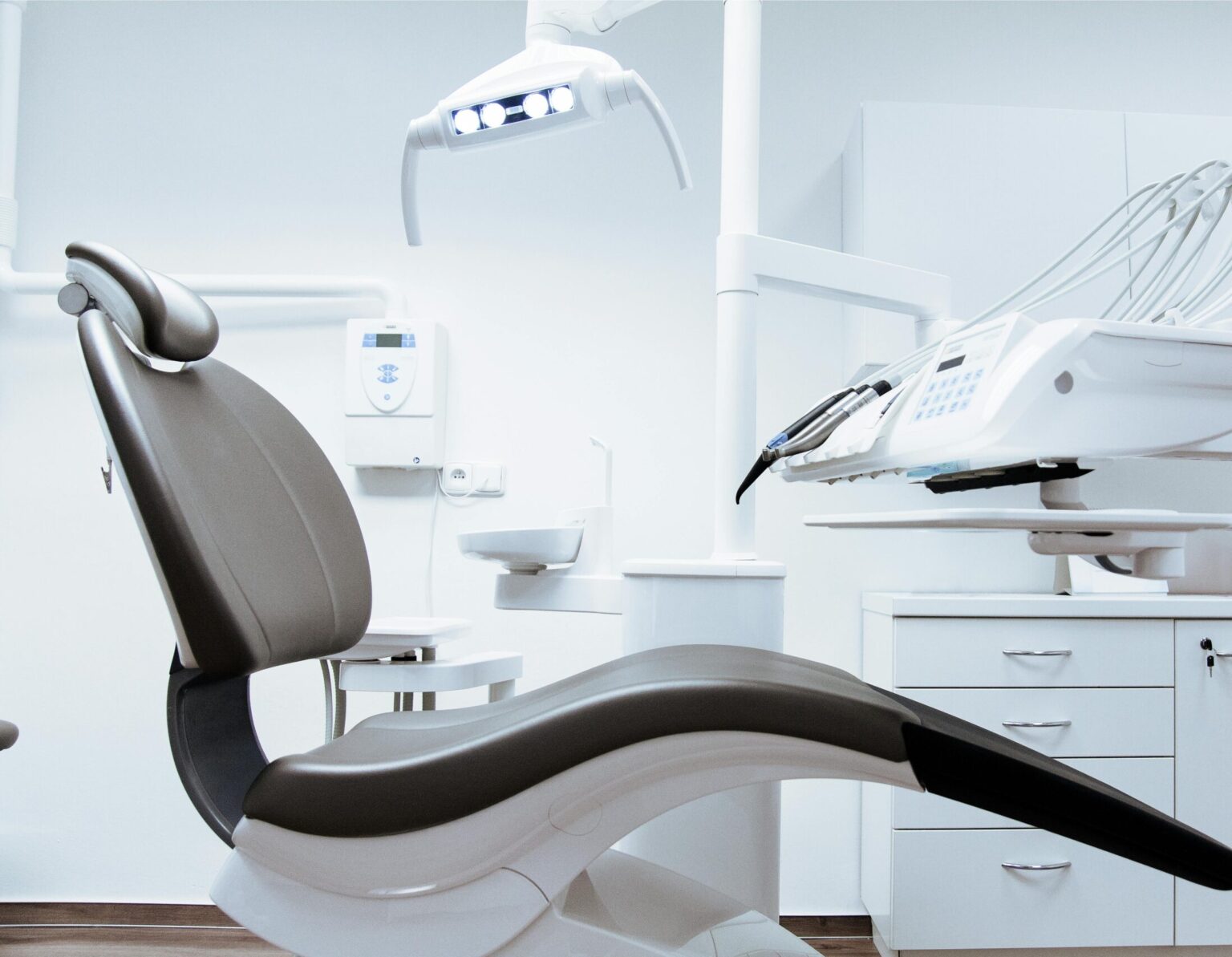 Black and White Dentist Chair and Equipment